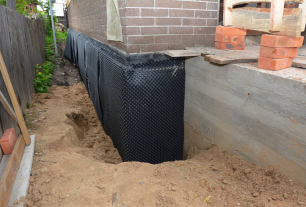 SJ Waterproofing Pros technician performing targeted Exterior Waterproofing assessment in Cross Junction, VA
